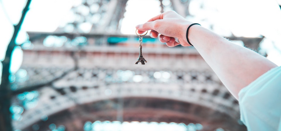 Eiffel Tower with miniature keyring in the forefront
